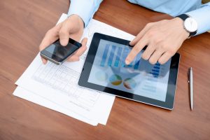 Man working with modern devices